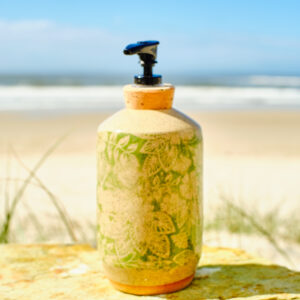 Her green foliage dispenser