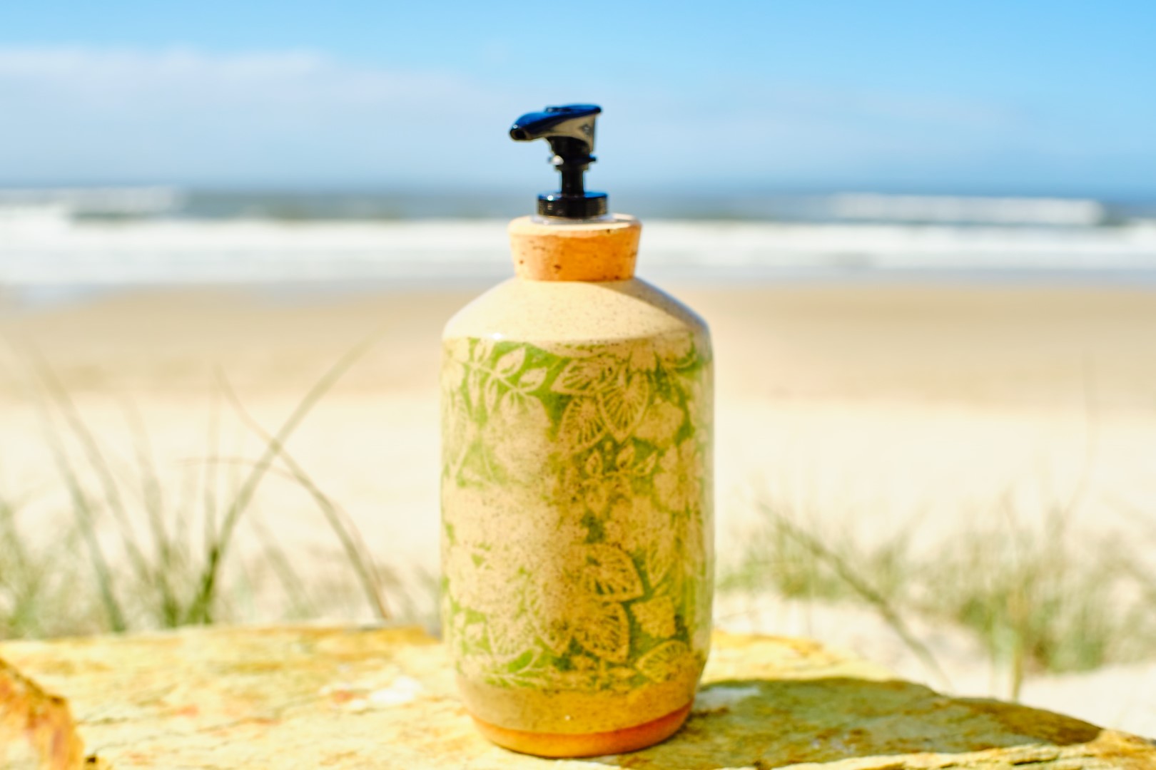 Her green foliage dispenser